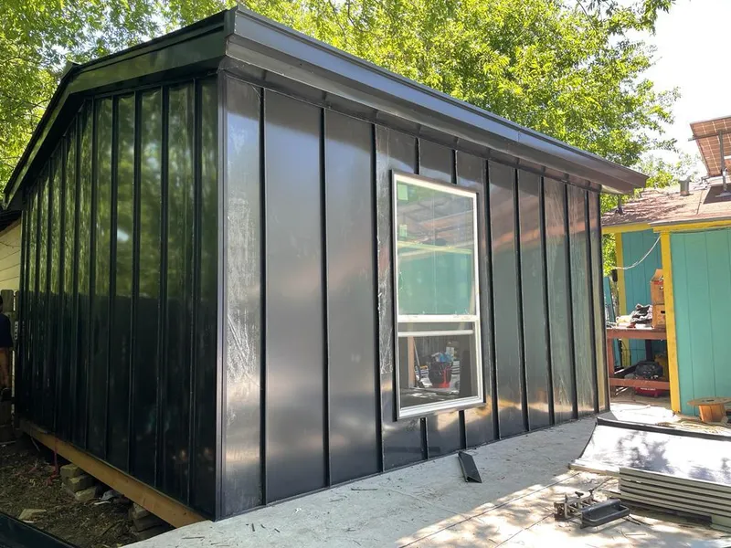 Black standing seam metal wall panels for Roof Inspection in Nitro