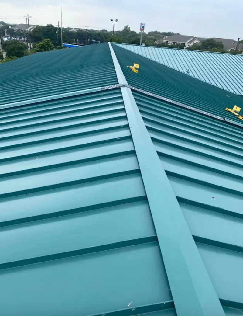Green commercial metal roof ridge and valley for Metal Roof Repair in Nitro